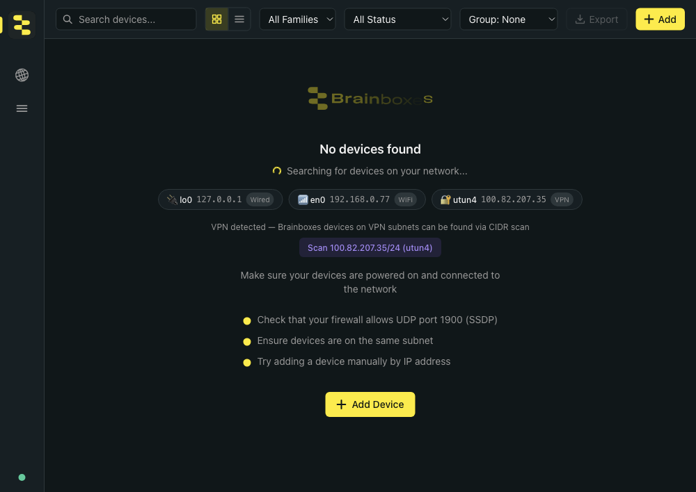BB-Eco's empty-dashboard state. Centre of the screen shows the Brainboxes logo, a 'No devices found' headline, a small spinner with the message 'Searching for devices on your network…', and a row of network-interface chips below — lo0 (Wired, 127.0.0.1), en0 (WiFi, 192.168.0.77) and a VPN tunnel utun4 (100.82.207.35). A 'VPN detected' line offers a purple 'Scan 100.82.207.35/24 (utun4)' button to find Brainboxes devices on that VPN subnet, followed by a checklist (firewall on UDP 1900, same-subnet check, manual IP entry) and an Add Device button.
