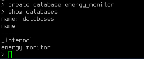 InfluxDB CLI showing create database energy_monitor command and show databases confirming energy_monitor exists