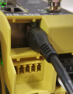 Mini USB cable connected to the BB-400 module USB port for eMMC flashing